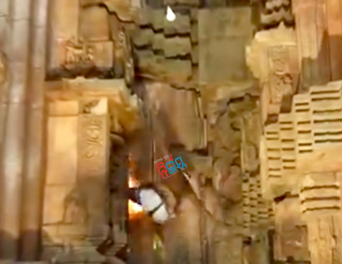 sevayat injured after falling while climbing top of lingaraj temple